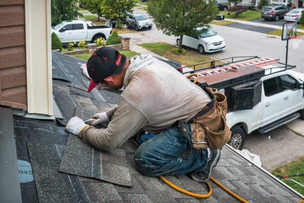 Professional Flat Roof Repair technician working in Olmstead, KY
